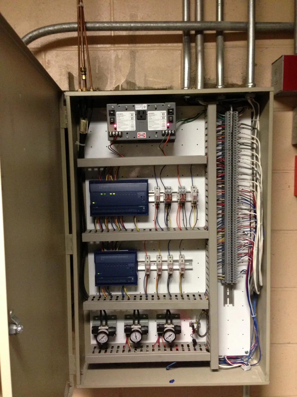 Open HVAC control panel with organized components